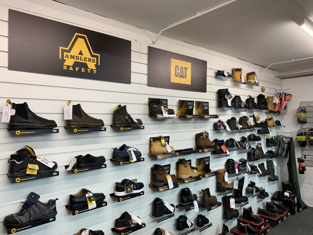 Cheltenham-PPE-Trade-Counter-Safety-Footwear-Boots-And-Shoes-Wall